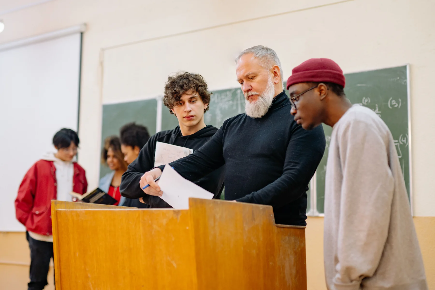 University lecturer guiding students